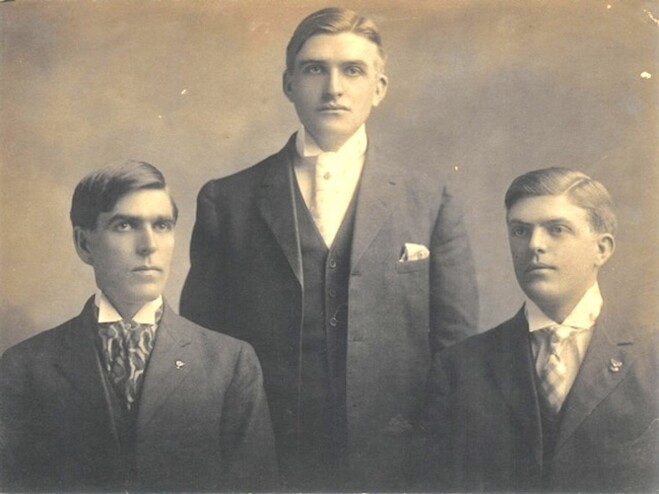 <em>Portrait of the Reed brothers with David on the right, Thomas in the middle, and Malcolm on the left. Courtesy of the Reed Family.</em>