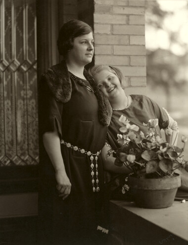 <em>Photograph of Laura and Ruth Reed by the front entrance to the Byrne-Reed House. Courtesy of the Reed family.</em>