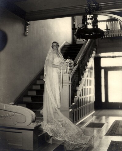 <em>Portrait of Ruth Reed on the staircase in the gallery of the Byrne-Reed House on her wedding day in 1934. Courtesy of the Reed family.</em>