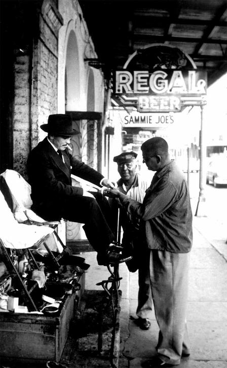 Griffin working at a shoeshine stand